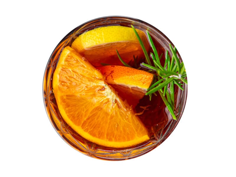 christmas mulled wine cocktail citrus and rosemary traditional drink new year holiday appetizer meal food snack on the table copy space food background rustic top view